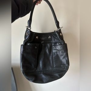 Like new marc by marc jacobs black leather hobo.  Magnetic closure. Full set!